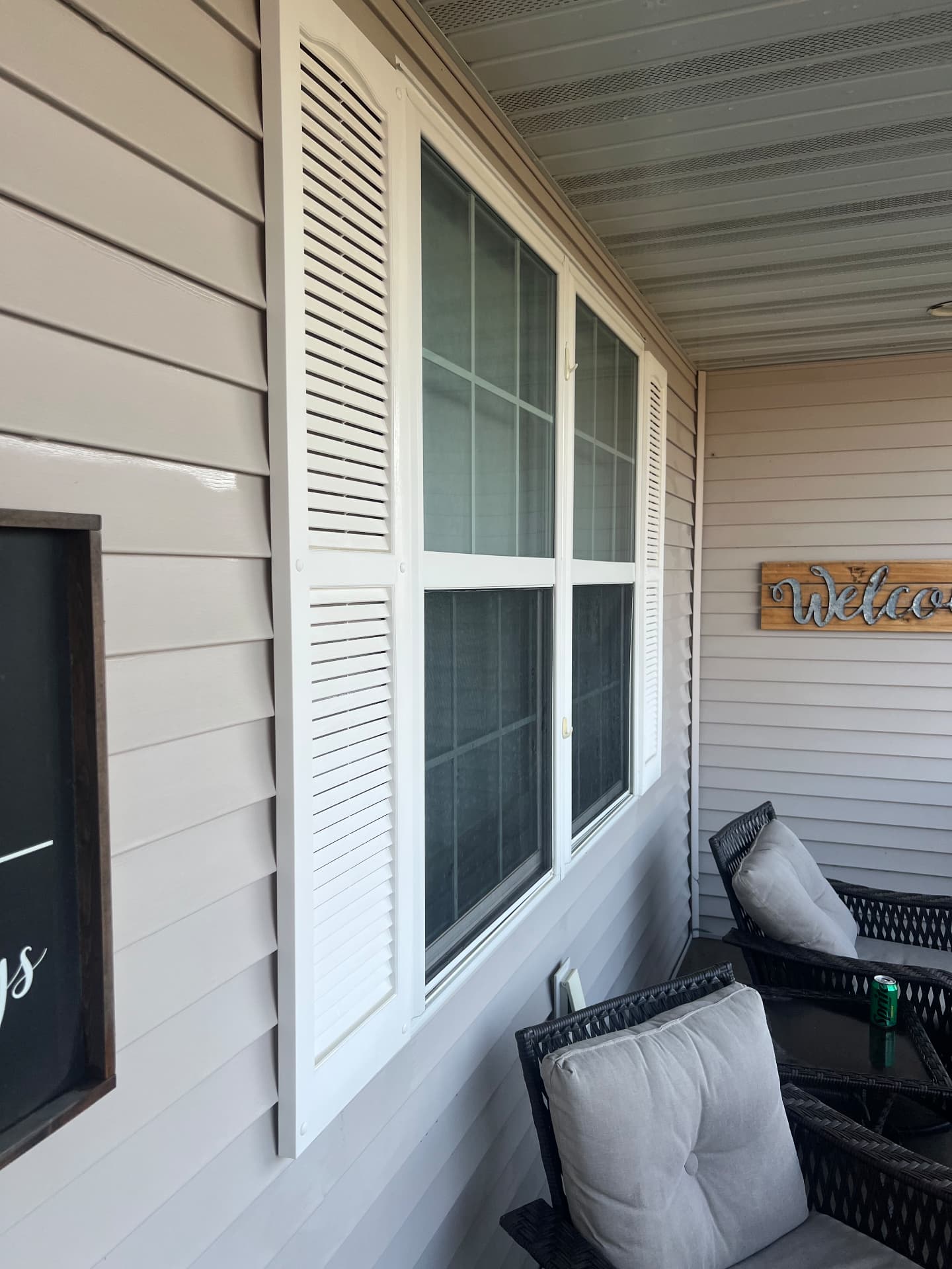Porch windows and white shutters